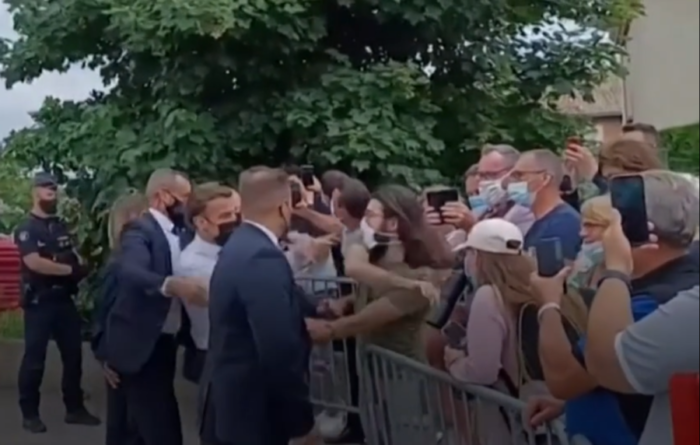 Image showing man slapping French President Macron